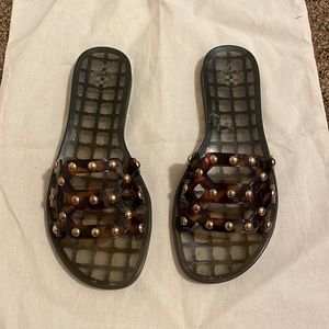 Tortoise colored jelly sandals